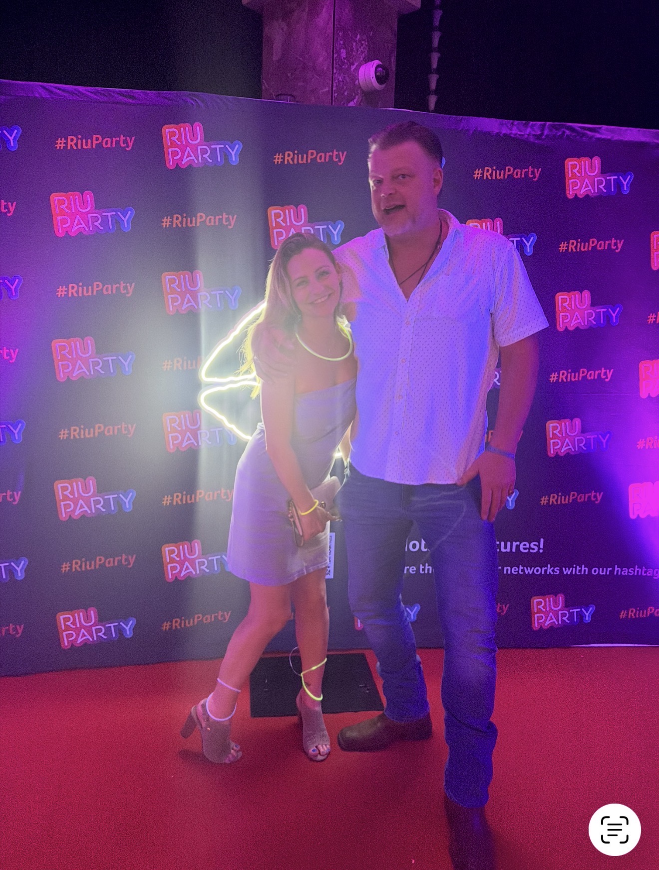 Patti and Brett at the neon Riu Party night at Riu Negril, Jamaica