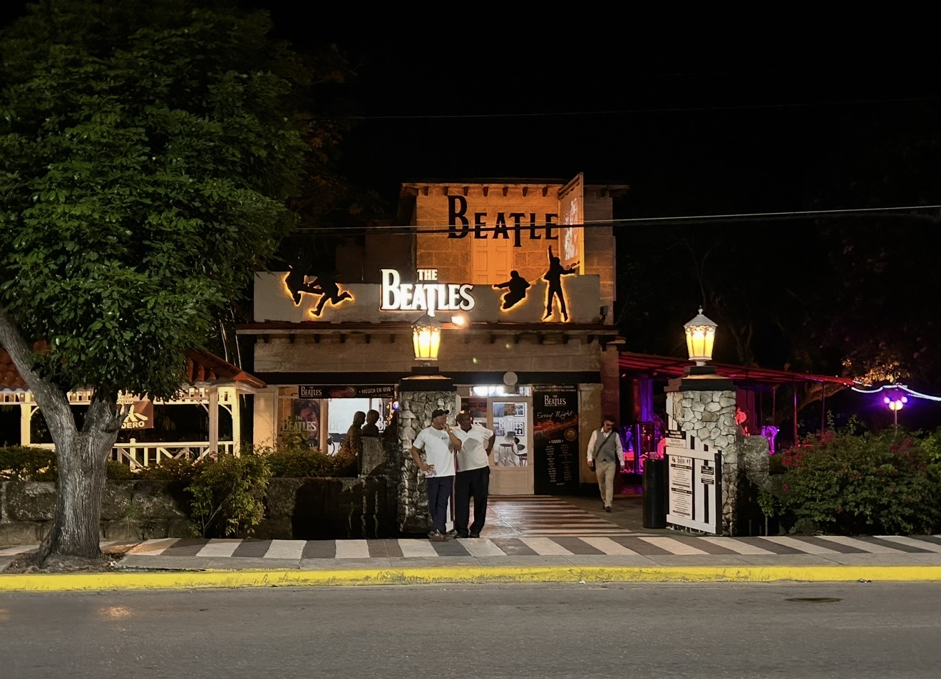 The Beatles Bar lit up at night in Varadero, Cuba